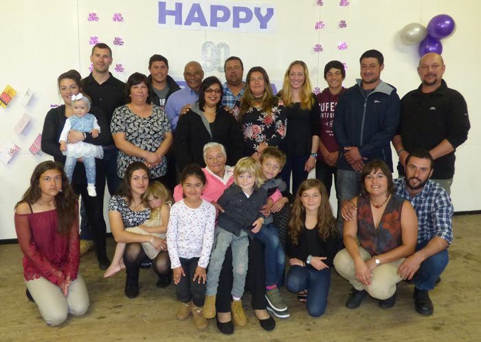 Isobel Swain with her grandchildren and their partners.