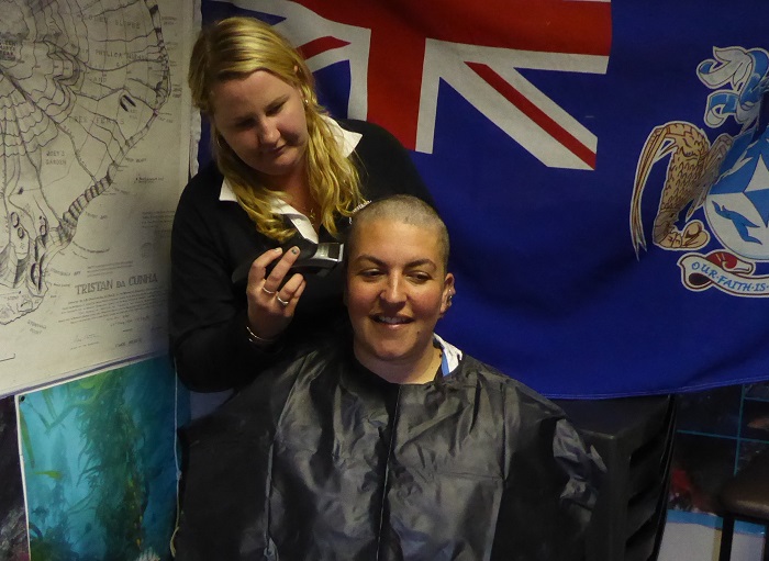 Finishing off the head shave.