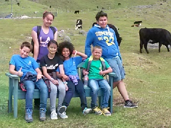 Children pause at a bench during their sponsored walk 2016