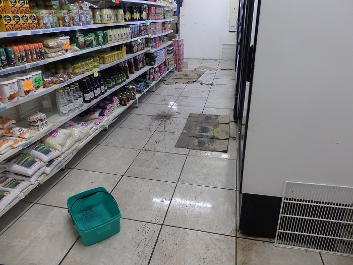 The aftermath of flooding in the island store.