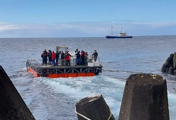 Passengers embarking on the MFV Lance