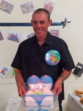 Wayne Swain with his 30th birthday cake.