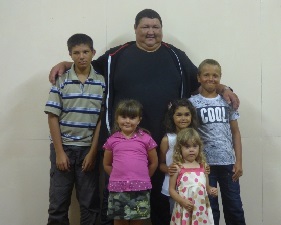 Jonathan with his godchildren.