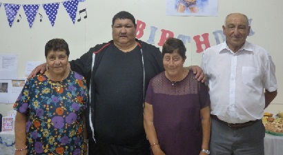 Jonathan with his grandparents.