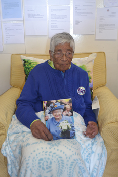 Ellen Rogers with the card from Her Majesty the Queen