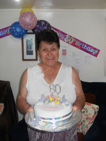 Joan Repetto with her 80th birthday cake.
