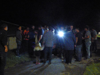 Gathering by the Gong at midnight