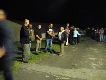Gathering by the Gong at midnight