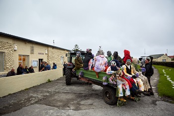 Okalolies on a tractor trailer arriving at Prince Philip Hall