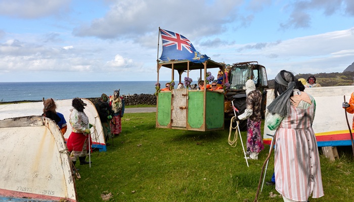 Edging past the longboats while approaching the side gate of the Residency.