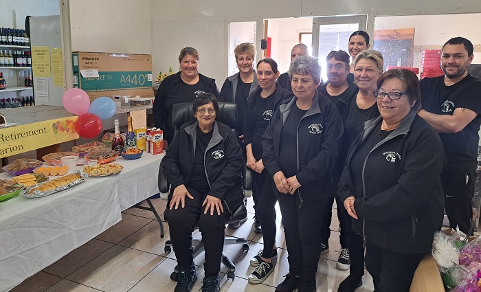 Marion with her colleagues at the island store