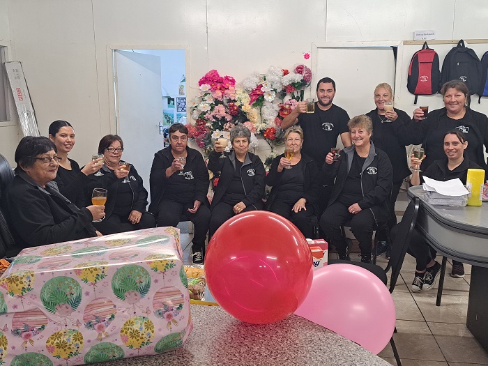 Colleagues toasting Marion