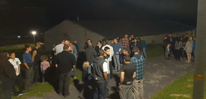 People gathered by the fishing dong around midnight