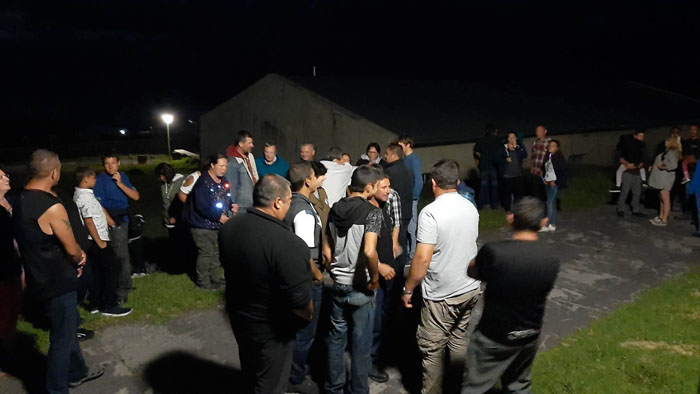 People gathered by the fishing dong around midnight