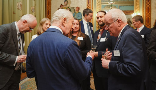 Chris Carnegy with the King at the Buckingham Palace Reception