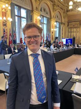 FCDO’s desk officer for Tristan Charles Wickham, just back from the island, in Tristan tie