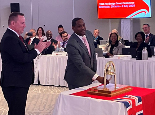 Bermuda&rsquo;s shipping minister Owen Darrell rings the bell to open the conference, watched by co-chair Christian Olsen of the Maritime and Coastguard Agency.