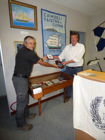 Gianfranco exchanges Camogli and Tristan plaques with Administrator Sean Burns over the Museum's Camogli display.