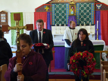Admin and Acting Chief Islander leaving Church