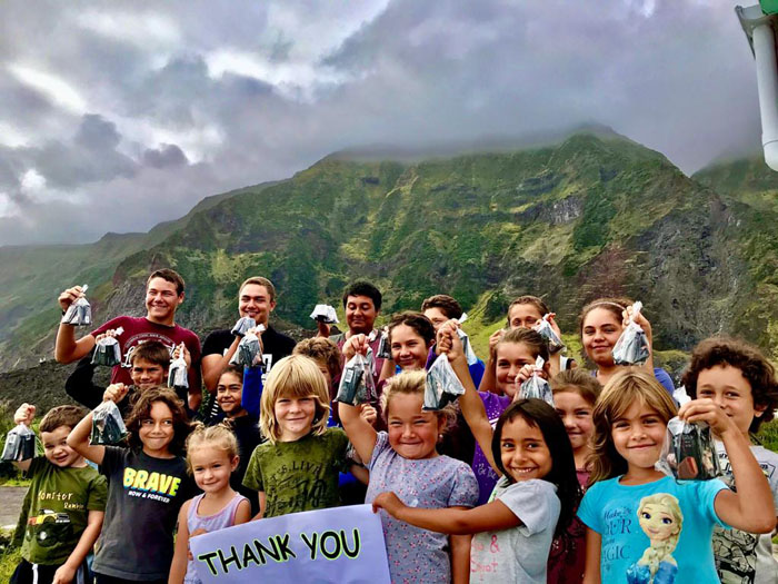 St Mary's School children with chocolates given by the Urchin's crew. Photo: 