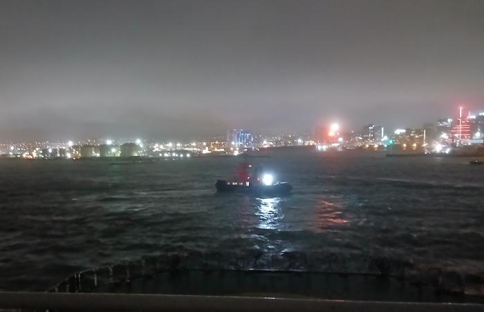 Receding Cape Town is lit up as the Pilot Boat sends the Agulhas II on her way.