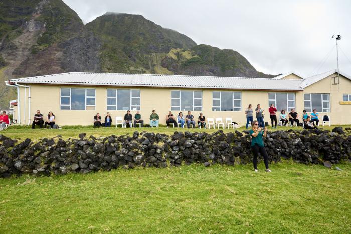 Parents watching from the school