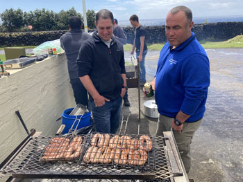 Julian Repetto and Simon Glass keeping an eye on the sausages
