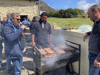 Co-Admnistrator Steve Townsend, Riaan Repetto and another waiting for the sausages