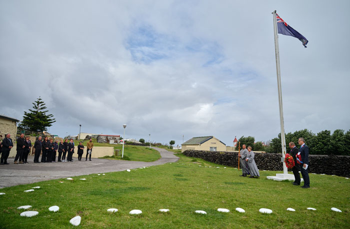A view of the Remembrance Sunday ceremony showing some of those watching from in front of the Prince Philip Hall.