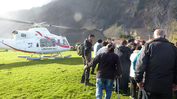 Visitors landing on Tristan da Cunha from the Agulhas II by helicopter.