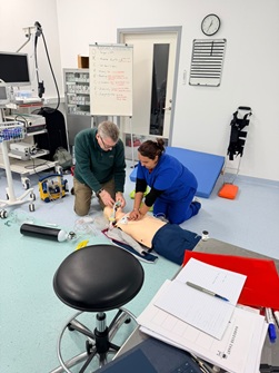 Prof. Ian Cumming conducting First Response Emergency Care training.