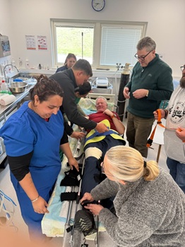 Prof. Ian Cumming conducting First Response Emergency Care training.