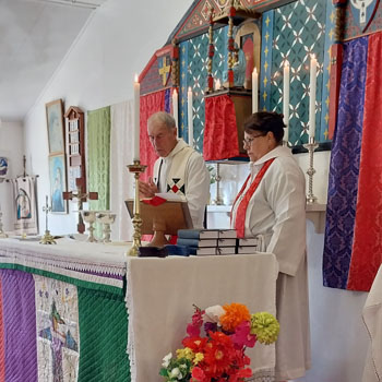 The Bishop assisted by Rev Margaret conducting the service