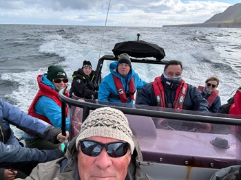Happy visitors in the Conservation RIB heading west.