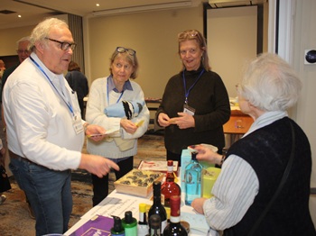 Torbj&ouml;rn & Pia Svensson and Susanne Spjuth at the raffle table. Photo: Mike Faulds