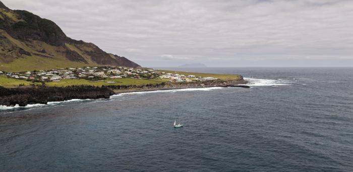 Yacht Nicolisa anchored off the settlement (Photo: Nick Schönfeld)