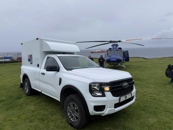 The Camogli Health Centre's ambulance pulls up by the Agulhas II helicopter.