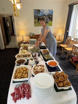 Louise Kendall lays out Christmas dinner and desserts.