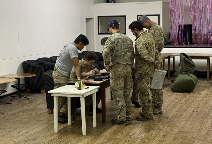 The team setting up base in Prince Philip Hall. Photo: Philip Kendall