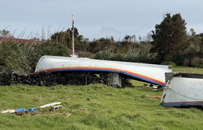 The longboat Britannia still lies astride the partially demolished Residency garden wall.