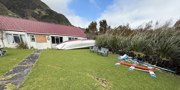 The Residency's benches may have been put back, but the longboat and its debris still remain.