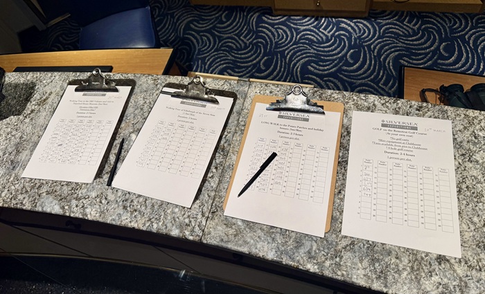 Sign-up sheets on the MV Silver Cloud for walking tours and golf. Photo: Philip Kendall