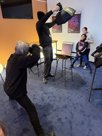 Glenda and Holly Rogers get the Hollywood treatment from photographers anxious to capture new stars of the silver screen from Tristan da Cunha.