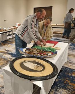 Trevor Groen discussing his family's display with Gwyneth Cooper Photos: Peter Millington