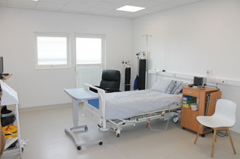 Bed in ward - from the door