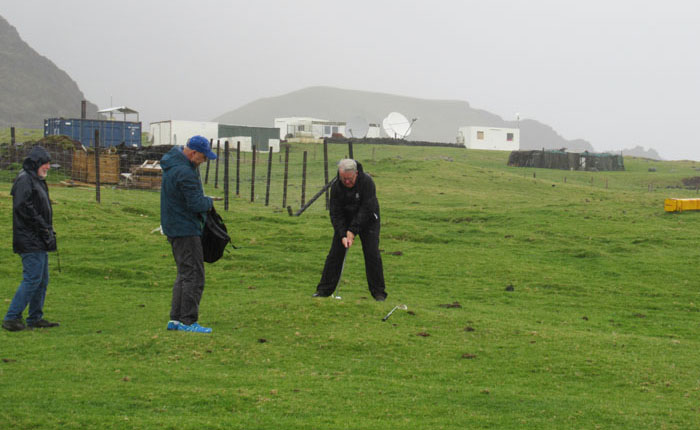 Hardy players on the Tristan golf course. The CTBTO monitoring station and Hillpiece are in the background