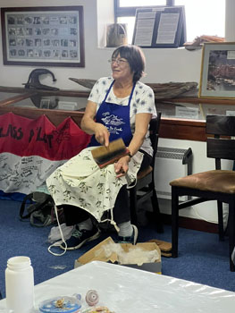 Judy Green carding wool at the craft day
