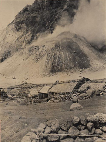 Volcanic cone viewed above an island cottage