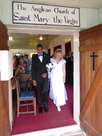 Kelly and Shane Green leave St Mary's Church after their marriage.