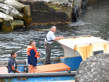 The launch bringing Andres ashore.